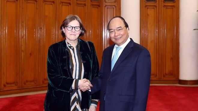 Prime Minister Nguyen Xuan Phuc (R) and EP Vice President Heidi Hautala (Source: VNA) 