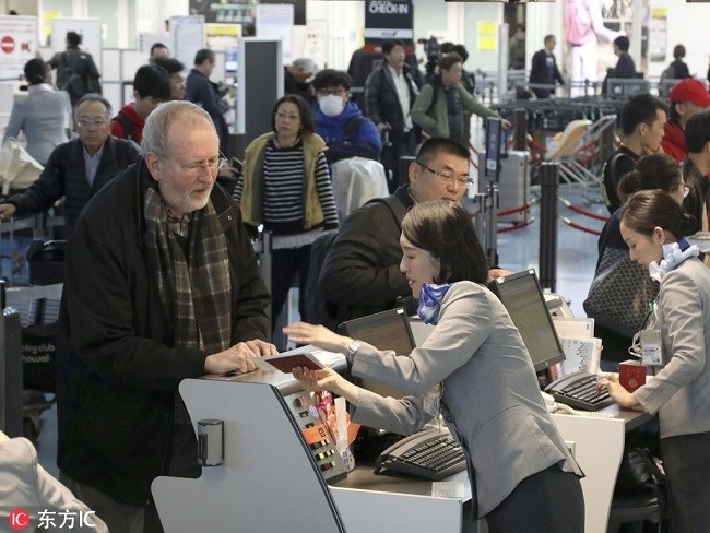 Passengers check in for international flights at Tokyo's Haneda airport on Jan 7, 2019, the day Japan introduced a JPY1,000 (US$9) departure tax. (Photo: IC)