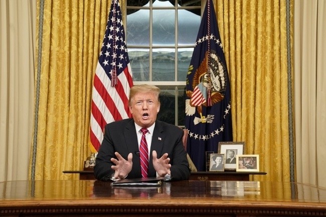 US President Donald Trump delivers a televised address to the nation from his desk in the Oval Office about immigration and the southern US border on the 18th day of a partial government shutdown at the White House in Washington, US, January 8, 2019. (File photo: Reuters)