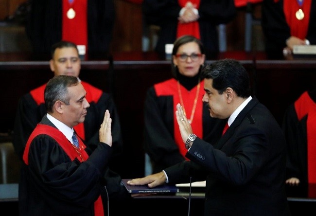 Venezuela's President Nicolas Maduro is sworn in by Venezuela's Supreme Court President Maikel Moreno, during the ceremonial swearing-in for his second presidential term, at the Supreme Court in Caracas, Venezuela on January 10, 2019. (Photo: Reuters)