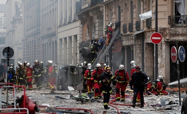 Firemen work at the site of an explosion in a bakery shop in the 9th District in Paris. (Photo: Reuters)