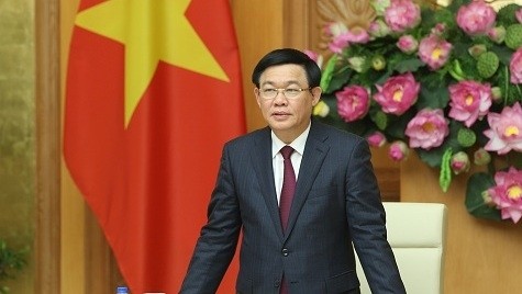 Deputy Prime Minister Vuong Dinh Hue speaks at the conference (Photo: VGP)