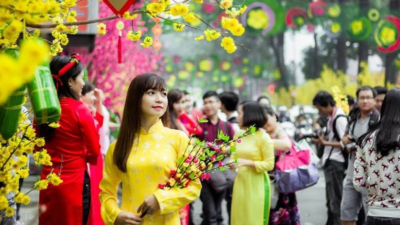 Society has changed and celebrating Tet also needs to change. (Photo: The thao - Van hoa)