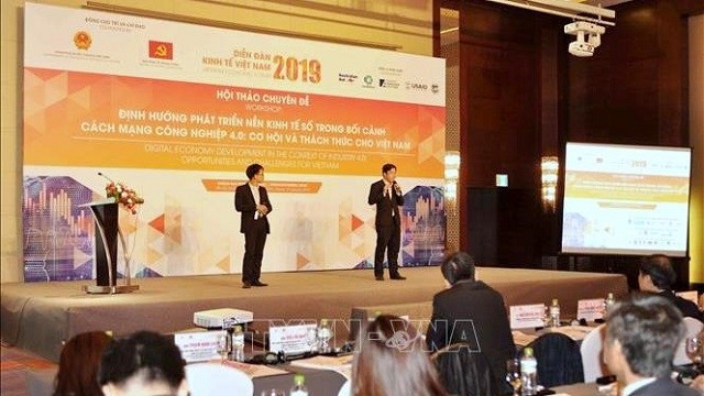 The seminar focuses on opportunities and challenges for Vietnam in developing its digital economy in the context of the fourth Industrial Revolution. (Photo: VNA)