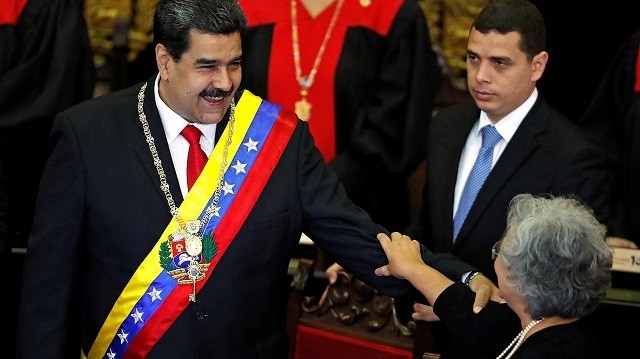 Venezuela's President Nicolas Maduro greets National Electoral Council President Tibisay Lucena during a ceremony to mark the opening of the judicial year at the Supreme Court of Justice, in Caracas, Venezuela, January 24, 2019. (Photo: Reuters)