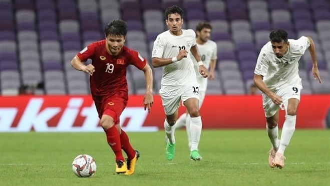 Nguyen Quang Hai (L) turned in more stunning performances at the Asian Cup. (Photo: VNA)