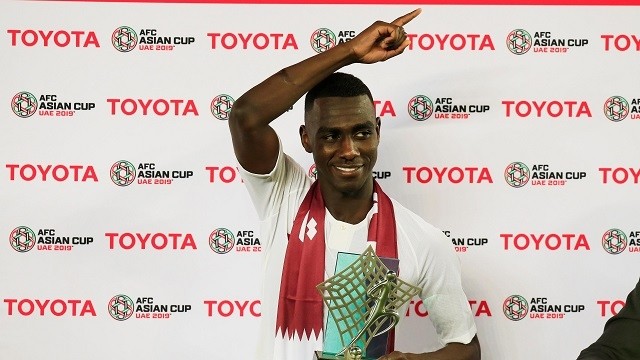 Qatar's Almoez Ali poses with the trophy for most valuable player of the tournament after winning the Asian Cup 2019. (Photo: Reuters)