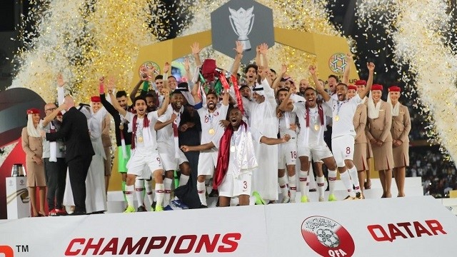 Qatari players lift the Asian Cup 2019 trophy. (Photo: AFC)