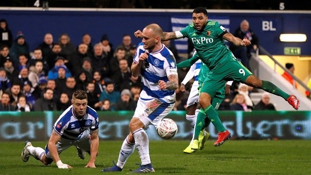 Watford's Troy Deeney in action with Queens Park Rangers' Jake Bidwell and Toni Leistner - FA Cup Fifth Round - Queens Park Rangers v Watford - Loftus Road, London, Britain - February 15, 2019. (Photo: Reuters)