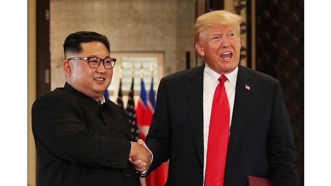 Kim Jong Un, Chairman of the Workers' Party of Korea and Chairman of the State Affairs Commission of the DPRK, and US President Donald Trump in their bilateral meeting in Singapore last June. (Photo: Reuters)