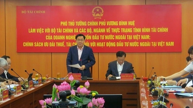 Deputy Prime Minister Vuong Dinh Hue speaks at a working session with the Ministry of Finance in Hanoi on February 28. (Photo: VOV)