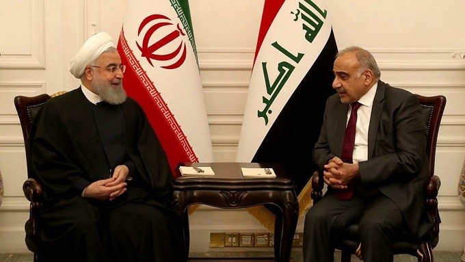 Iraqi Prime Minister Adel Abdul Mahdi (R) meets Iranian President Hassan Rouhani in Baghdad, March 11. (Reuters)