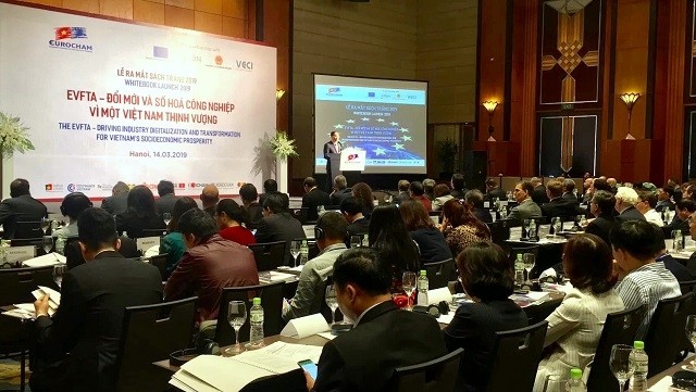 The EuroCham launched its 11th Whitebook in Hanoi on March 14. (Photo: QDND)