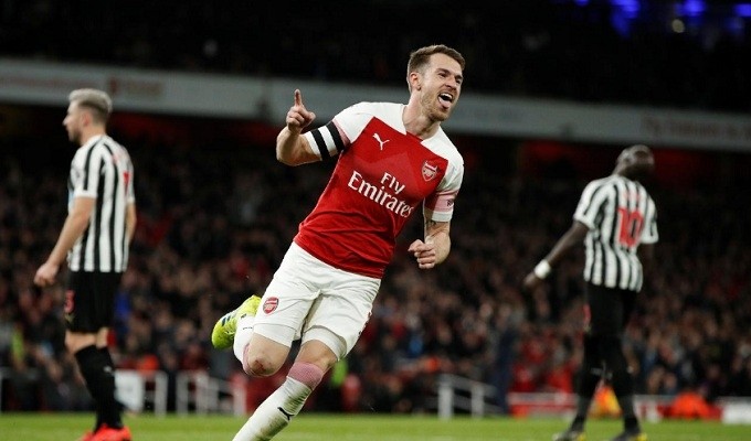 Arsenal's Aaron Ramsey celebrates scoring their first goal. (Reuters)