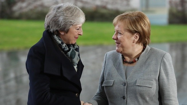British Prime Minister Theresa May (L) is to meet German Chancellor Angela Merkel in Berlin to discuss the state of the Brexit process.
