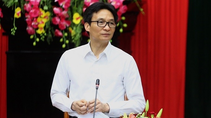 Deputy PM Vu Duc Dam speaks at the working session. (Photo: VGP)