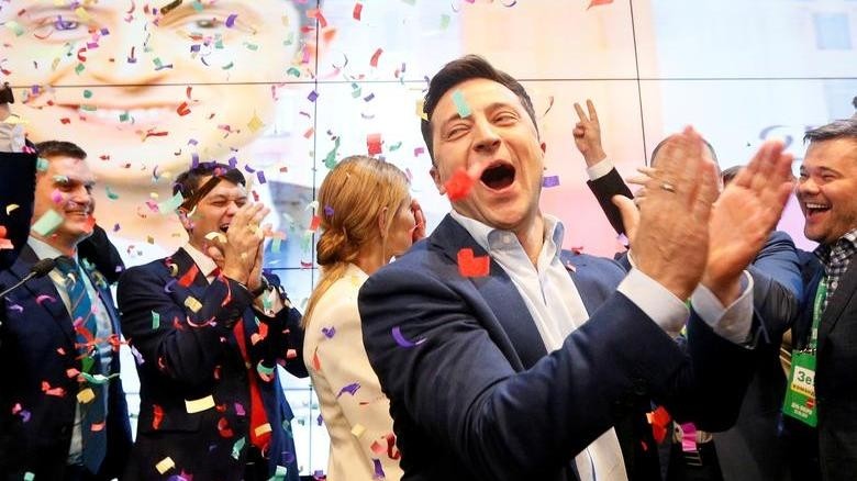 Ukrainian presidential candidate Volodymyr Zelensky reacts following the announcement of the first exit poll at his campaign headquarters in Kiev, Ukraine. (Reuters)