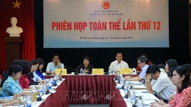 The plenary session of the 12th NA Committee on Social Affairs was held in Ho Chi Minh City on April 25. (Photo: VNA)