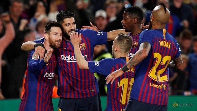 La Liga Santander - FC Barcelona v Levante - Camp Nou, Barcelona, Spain - April 27, 2019 Barcelona's Lionel Messi celebrates scoring their first goal with Luis Suarez and team mates. (Reuters)