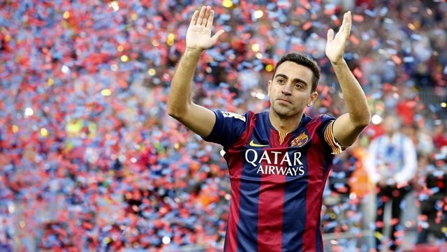 Barcelona's Xavi Hernandez waves to supporters after their Spanish first division soccer match against Deportivo de la Coruna at Camp Nou stadium in Barcelona, Spain, May 23, 2015. (Photo: Reuters)