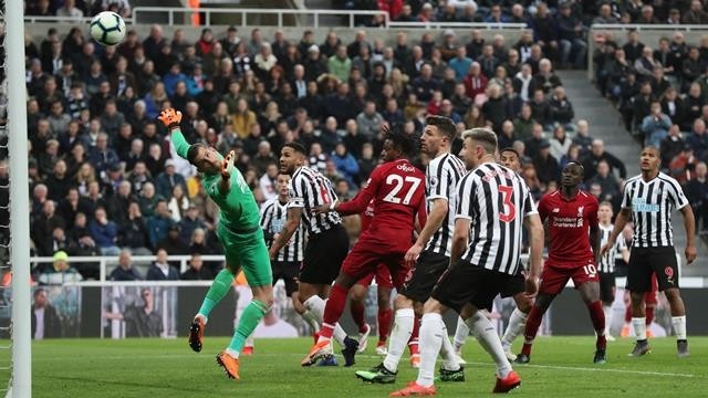 Liverpool's Divock Origi scores their third goal - Premier League - Newcastle United v Liverpool - St James' Park, Newcastle, Britain - May 4, 2019. (Photo: Reuters)