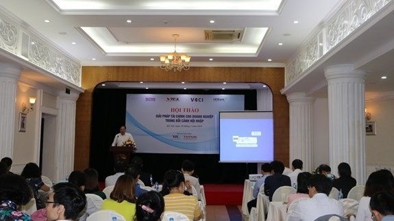 A meeting held in Hanoi on May 10 discussed financial solutions for businesses amid the current context in which roughly 20 percent of firms in need of funding still have problems gaining access to credit. (Photo: VNA)