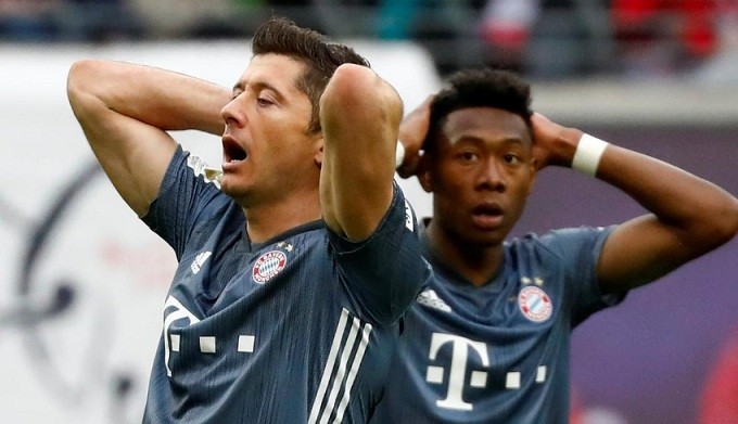 Bundesliga - RB Leipzig v Bayern Munich - Red Bull Arena, Leipzig, Germany - May 11, 2019 Bayern Munich's Robert Lewandowski and David Alaba react. (Reuters)