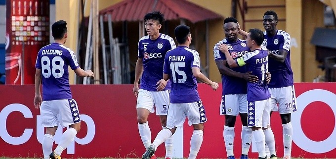 Hanoi FC players celebrate Oseni's opening goal. (Photo: AFC)