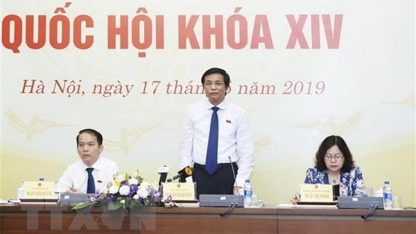 National Assembly Secretary General Nguyen Hanh Phuc (standing) speaks at the press conference on May 17 (Photo: VNA)
