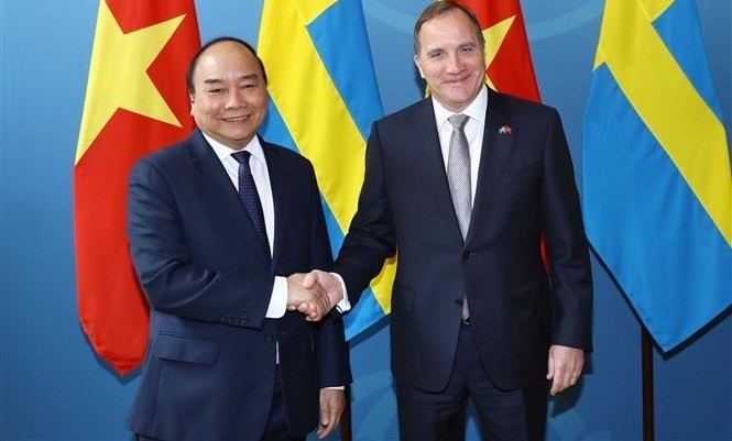 Prime Minister Nguyen Xuan Phuc and Swedish Prime Minister Stefan Loefven (Photo: VNA)