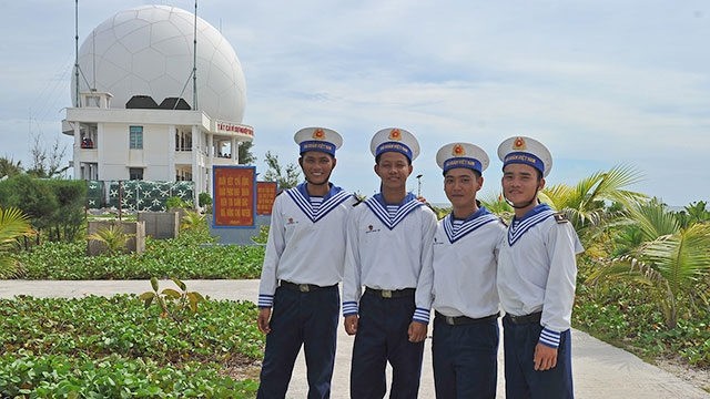 Optimistic smiles on the faces of young naval soldiers on Phan Vinh island 