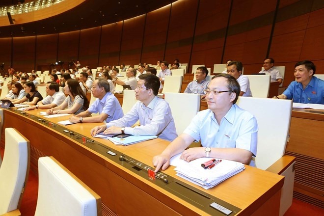 Lawmakers at the 7th session of the 14th National Assembly (Photo: VNA)