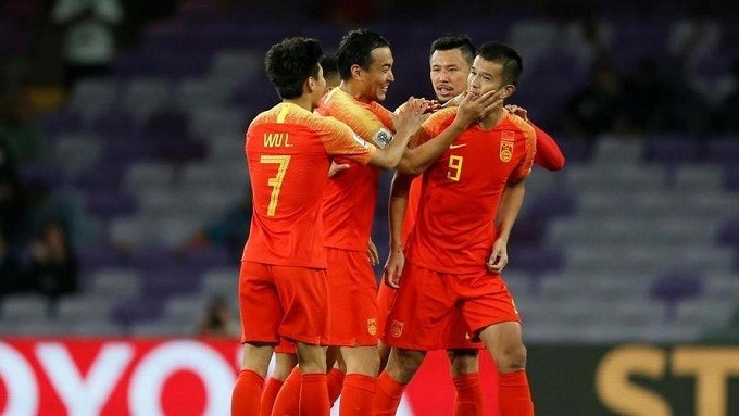 China's players celebrate after coming from behind to beat Iran and reach the 2019 Asian Cup quarter-finals. (Reuters)