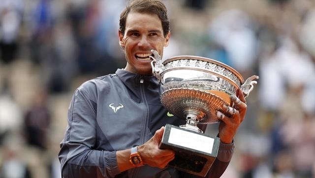 Spain's Rafael Nadal celebrates with the trophy after his final match against Austria's Dominic Thiem - French Open - Roland Garros, Paris, France - June 9, 2019. (Photo: Reuters)