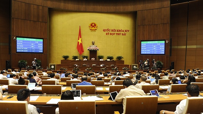 Revisions to the two laws are adopted with more than 90% of the votes in favour. (Photo: Dang Khoa)