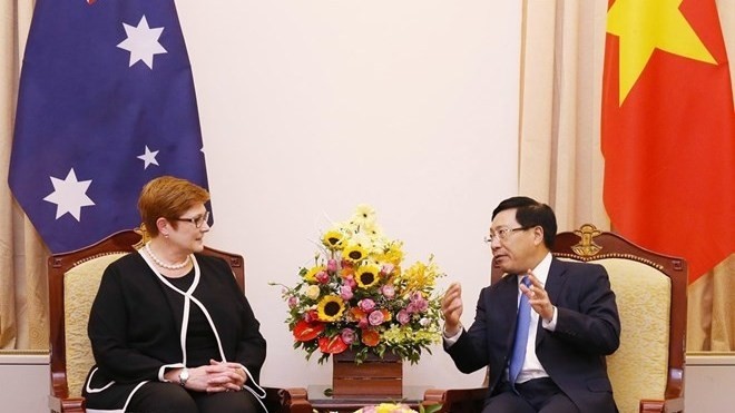 Deputy Prime Minister and Foreign Minister Pham Binh Minh (R) and Australian FM Marise Payne (Photo: VNA)