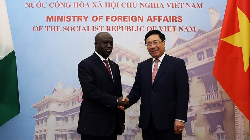 Deputy PM Pham Binh Minh and Foreign Minister of the Ivory Coast Marcel Amon-Tanoh (Photo: VGP)