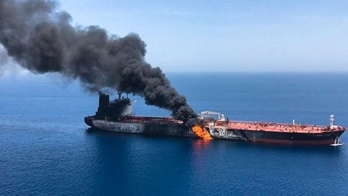 Fire and smoke billow from the Norwegian owned Front Altair tanker, which was said to have been attacked in the Gulf of Oman. (Photo: Getty)