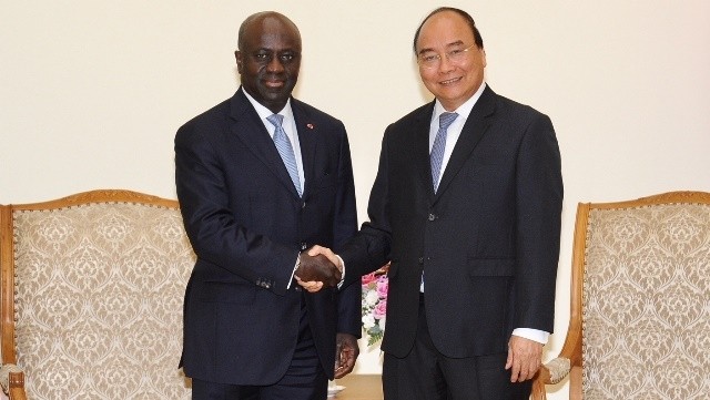 PM Nguyen Xuan Phuc (R) and FM of Ivory Coast Marcel Amon-Tanoh (Photo: NDO/Tran Hai)