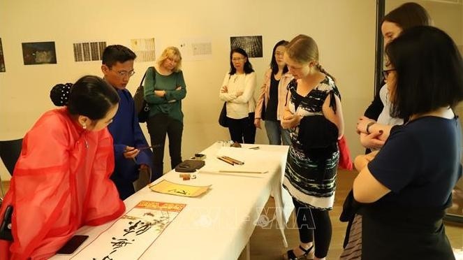 The art of Vietnamese calligraphy introduced to visitors at the event (Photo: VNA)