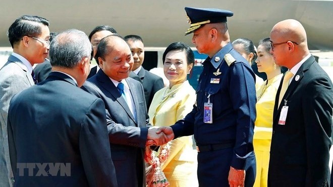 Prime Minister Nguyen Xuan Phuc and his spouse and entourage arrived in Don Mueang airport in Bangkok, Thailand, on June 22 (Photo: VNA)
