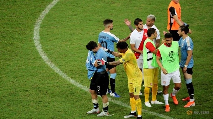 Copa America Brazil 2019 - Quarter Final - Uruguay v Peru - Arena Fonte Nova, Salvador, Brazil - June 29, 2019 Uruguay's Luis Suarez looks dejected as Peru's Pedro Gallese consoles him. (Reuters)