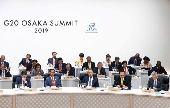 Prime Minister Nguyen Xuan Phuc and delegates at the G20 Summit in Japan. (Photo: VNA)