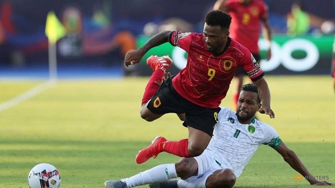 Africa Cup of Nations 2019 - Group E - Mauritania v Angola - Suez Army Stadium, Suez, Egypt - June 29, 2019 Angola's Fredy Ribeiro in action with Mauritania's Bessam. (Reuters)