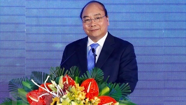 PM Nguyen Xuan Phuc speaks at the conference. (Photo: VNA)
