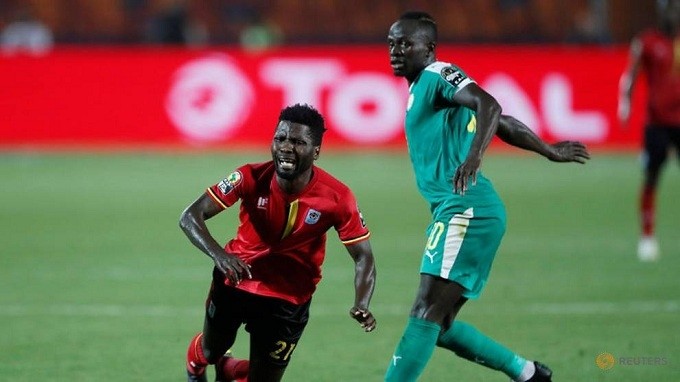Africa Cup of Nations 2019 - Round of 16 - Uganda v Senegal - Cairo International Stadium, Cairo, Egypt - July 5, 2019 Uganda's Allan Kyambadde in action with Senegal's Sadio Mane. (Reuters)