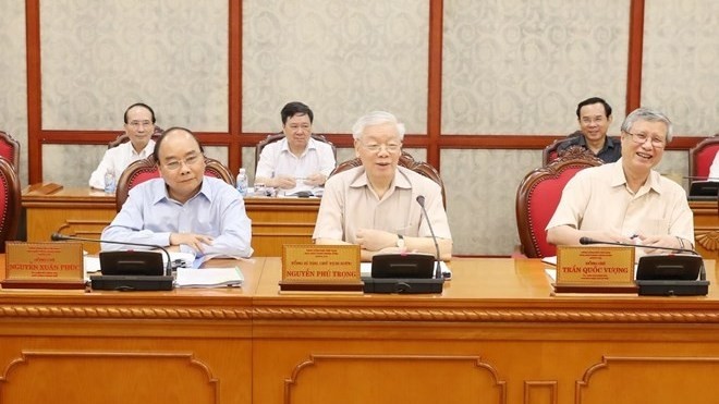 Party General Secretary and President Nguyen Phu Trong (middle) at the meeting (Photo: VNA)