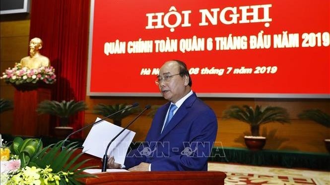 PM Nguyen Xuan Phuc speaks at the conference. (Photo: VNA)