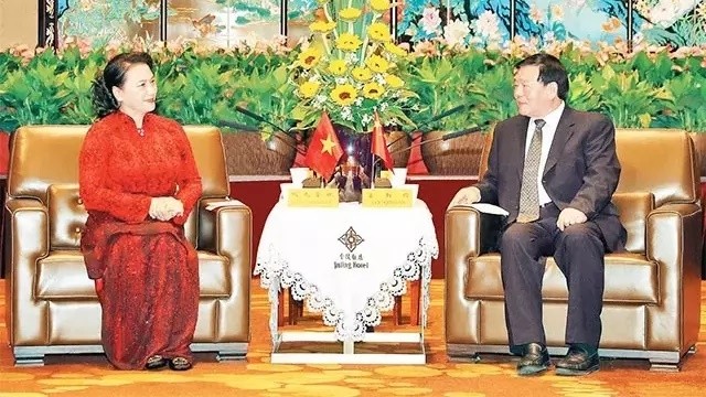 NA Chairwoman Nguyen Thi Kim Ngan and Jiangsu Secretary Lou Qinjian (Photo: VNA)