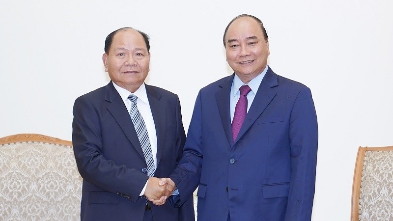 Prime Minister Nguyen Xuan Phuc and Lao Minister of Home Affairs Khamman Sounvileuth (Photo: VGP)